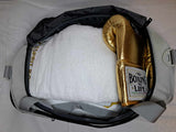 Sac de sport boxe 50 L gris clair vu du dessus, poignées et bandoulière grises