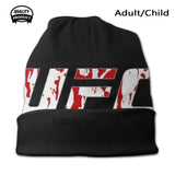 Bonnet UFC noir vu de face avec le bas replié en revers court