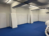 Protection de mur pour un club de JJB (jiu-jitsu brésilien)