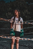 Boxeur en entraînement (training camp) avec les gants de sparring Esprit Boxe vert métallique