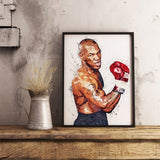 Tableau Mike Tyson bras leve, gant rouge Everlast, eclaboussures sur fond blanc, vue rapprochee de la toile
