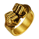 Bague boxe double poings, finition dorée, manchettes à motif perforé
