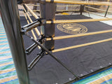 Ring de boxe au sol démontable, poteaux d'angle et cordes tendues