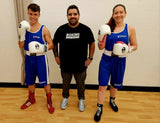 Tenue de boxe amateur bleue portée par deux boxeurs du Boxing Club Fribourg