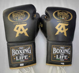 Gants de boxe Canelo Álvarez noir et or, logos dorés No Boxing No Life, monogramme CA et Hecho en Mexico
