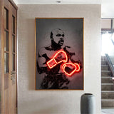 Tableau Floyd Mayweather en silhouette avec gants en neon rouge, affiche dans un salon