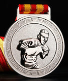 Médaille de boxe finition argent, relief d’un boxeur