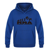 Sweat à capuche MMA Making Progress bleu roi, logo noir, frise de l'évolution jusqu'au combattant