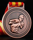 Médaille de boxe finition bronze, relief d’un boxeur