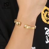 Bracelet jonc gant de boxe en acier, vue trois quarts