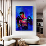 Tableau Mohamed Ali bleu, portrait en aplats bleus violets et jaunes, affiche dans un salon
