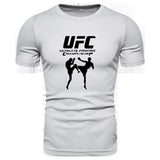 T-shirt UFC gris, logo UFC, Ultimate Fighting Championship et deux combattants en silhouette noire