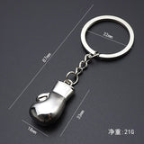 Cotes du porte-clés gant de boxe argent : gant 33 × 18 mm, anneau 32 mm, total 87 mm, 21 g