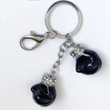 Porte-clés gants de boxe noirs laqués à strass, monture argent et mousqueton