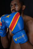 Boxeur en garde portant les gants de boxe Congo Esprit Boxe