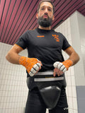 Coquille de boxe pro Esprit Boxe portée sous le short par un boxeur en salle