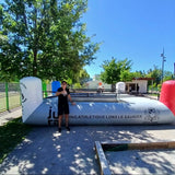 Ring gonflable blanc du Ring Athlétique Lons-le-Saunier installé en extérieur