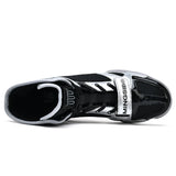 Chaussure de boxe noir et argent vue de dessus, sangle et laçage