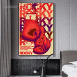 Tableau affiche Rocky vintage, gants rouges suspendus et lettrage repete, toile seule, sans cadre