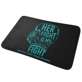 Tapis gant de boxe turquoise sur fond noir, vue de face