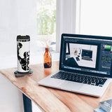 Mug isotherme boxe posé sur un bureau