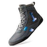 Chaussure de boxe grise de profil, bande latérale irisée