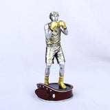 Statue de boxeur casqué, finition argent et doré, en garde