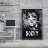 Tableau Rocky, visage compose de caracteres typographiques en noir et blanc, affiche dans un salon