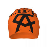 Bonnet No Boxing No Life orange vu de dos, monogramme CA imprimé en grand
