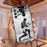 Coque Samsung Galaxy S Mohamed Ali, photographie noir et blanc du boxeur en garde immergé jusqu'aux mollets, reflets à la surface de l'eau