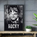 Tableau Rocky, visage compose de caracteres typographiques en noir et blanc, vue rapprochee de la toile