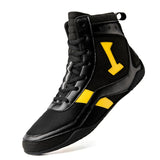 Chaussure de boxe noir et jaune, chiffre 1 jaune sur le quartier