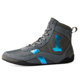 Chaussure de boxe grise vue de trois quarts arrière, boucle de talon