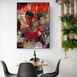 Tableau Mohamed Ali sur fond de slogans peints, gants rouges leves, accroche dans une entree