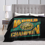 Plaid boxe ceinture WBC déployé sur un lit, sangle verte et plaque dorée
