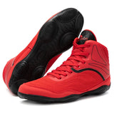 Chaussures de boxe rouge et noir, semelle noire à disques de pivot