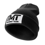 Bonnet TMT The Money Team noir tricot à revers avec étiquette blanche