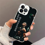 Coque UFC iPhone, photographie sombre de Conor McGregor tête levée, CONOR MCGREGOR en lettres verticales et sigle UFC aux couleurs irlandaises
