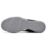 Semelle grise non marquante de chaussure de boxe, motif craquelé