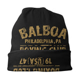 Bonnet Rocky Balboa noir porté avec le bas replié en revers court