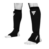 Protège-tibia chaussette noir, manchon extensible et chausson sous le pied