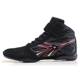 Chaussure de boxe noire et rouge à sangle scratch, vue de profil