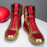 Chaussures de boxe rouge et or, semelle gomme caramel, paire de face