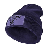 Bonnet No Boxing No Life bleu marine tricot à revers avec étiquette et monogramme CA
