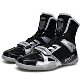 Chaussures de boxe noir et argent, paire vue de trois quarts