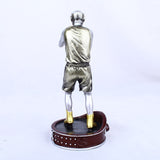 Statue de boxeur argent et doré, vue de dos