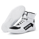 Chaussures de boxe blanches à lettrage BOXING noir, semelle blanche