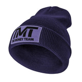 Bonnet TMT The Money Team bleu marine tricot à revers avec étiquette blanche
