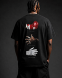 Dos du t-shirt noir : gant de boxe rouge Tyson, main baguée Jordan et gant blanc pailleté Jackson