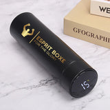 Bouteille isotherme boxe noire, marque Esprit Boxe dorée et affichage numérique de la température